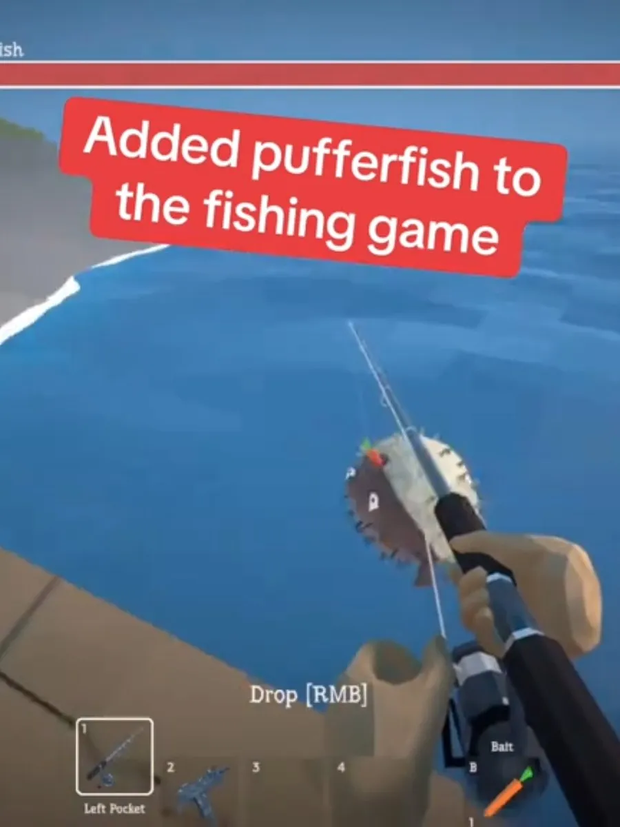 Clip still: a pufferfish on the line, caption reads “Added pufferfish to the fishing game”